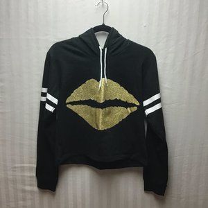 On Fire juniors black & white with gold lips jersey size is a large.